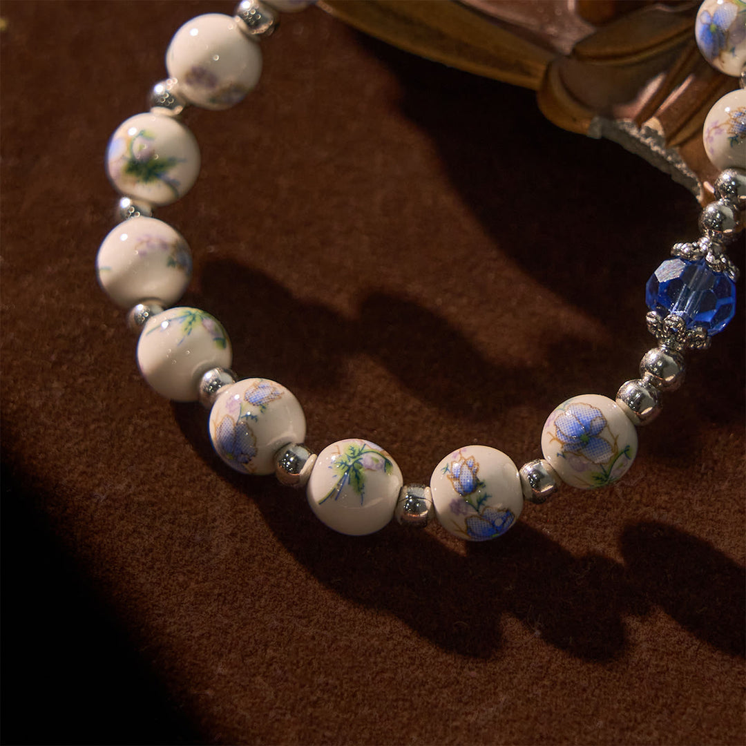 Christianartworkshop Multi-color Floral Ceramic Stretch Bracelet with Miraculous Medal & Crucifix: Subtle Faith Elegance